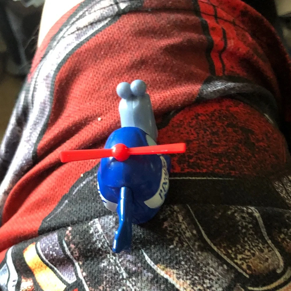 Blue Toy Helicopter with Red Rotor